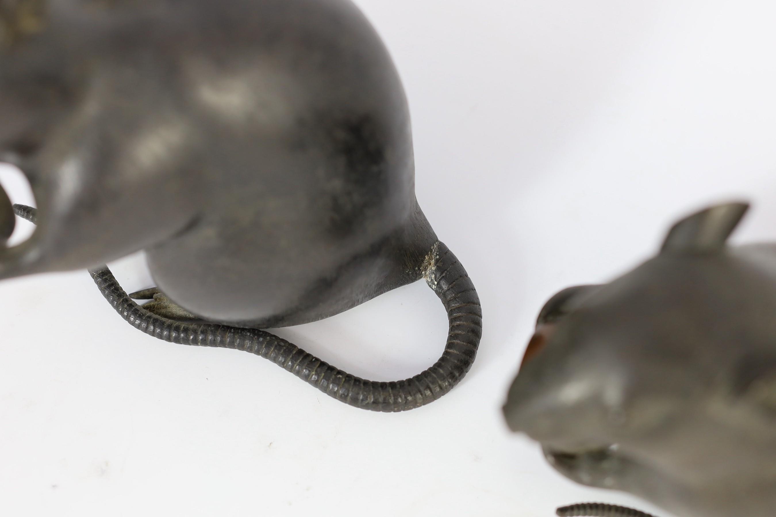 An assembled group of five Japanese bronze and mixed metal models of rats, Meiji period, smallest 9.5cm long, largest 16.5cm long, one small rat tail detached